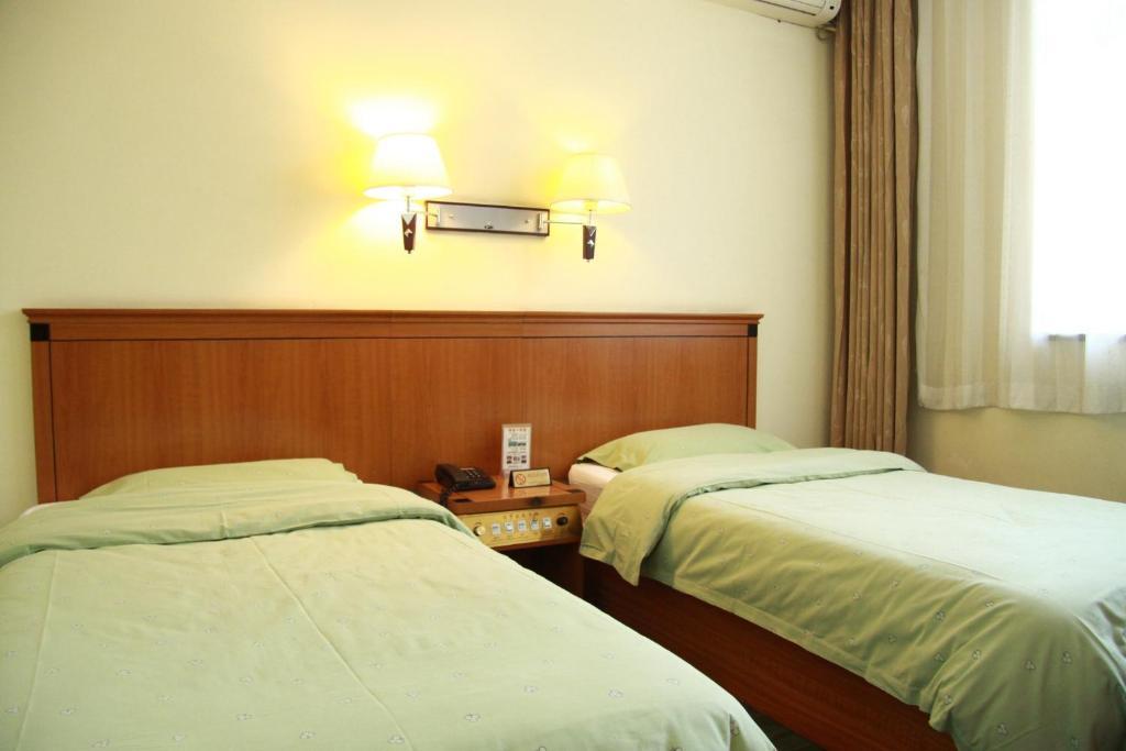 Beijing Fuxing Holiday Hotel Номер фото