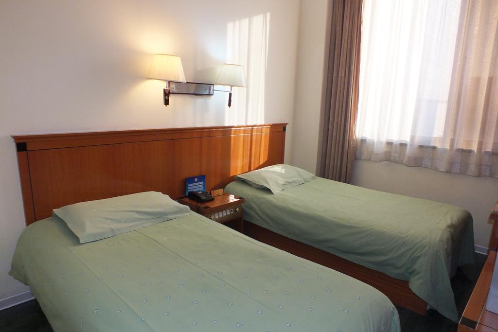 Beijing Fuxing Holiday Hotel Номер фото