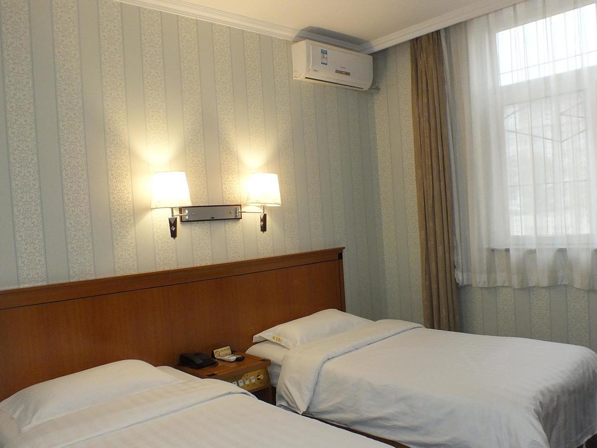Beijing Fuxing Holiday Hotel Номер фото