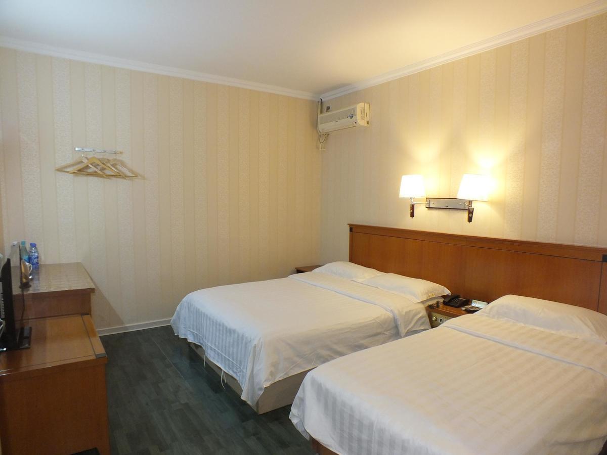 Beijing Fuxing Holiday Hotel Номер фото