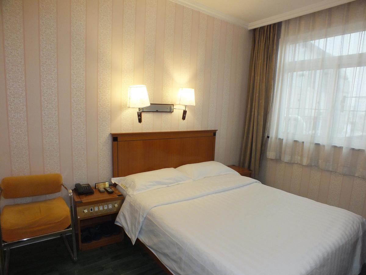 Beijing Fuxing Holiday Hotel Номер фото